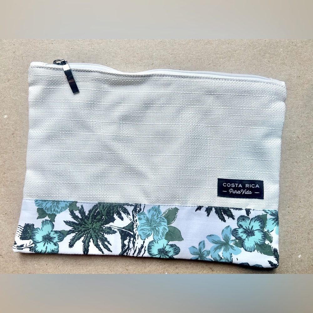 GUANA brand from Costa Rica - zip pouch in brand new condition.